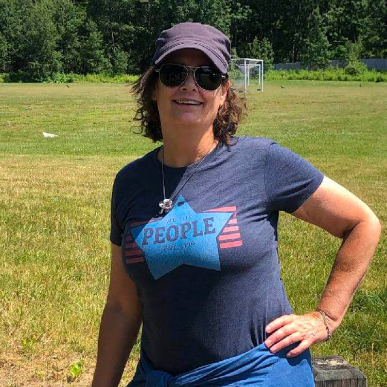 Annie B. - happy customer wearing our We the People Star Tee
